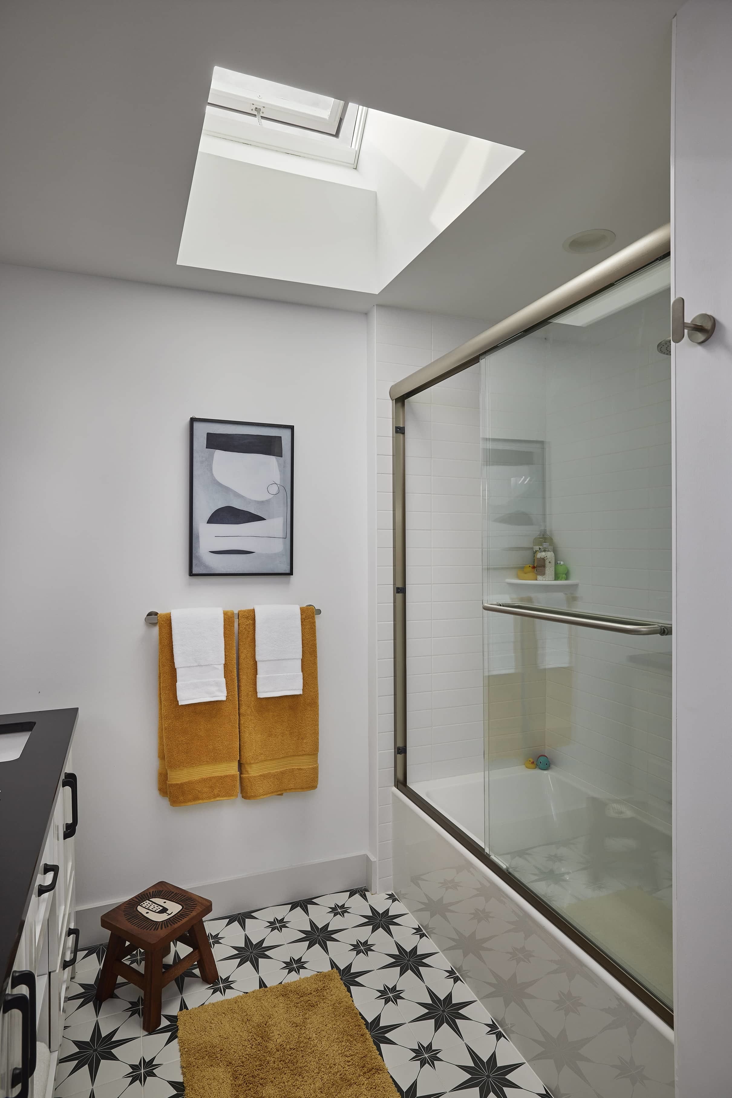 Bathroom small skylight white yellow black