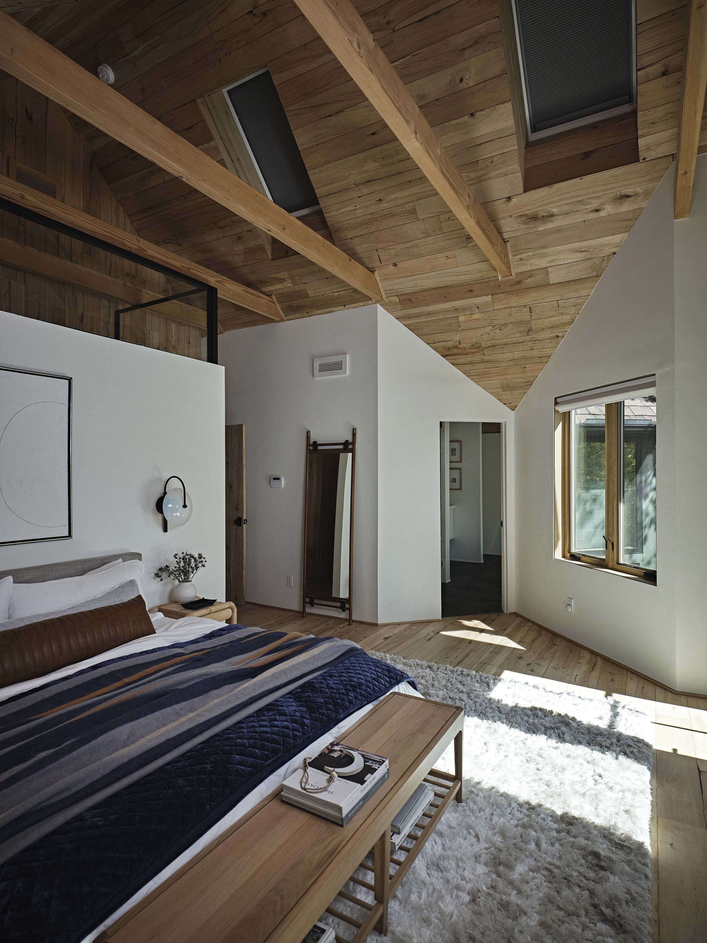 Bedroom with skylights shades closed