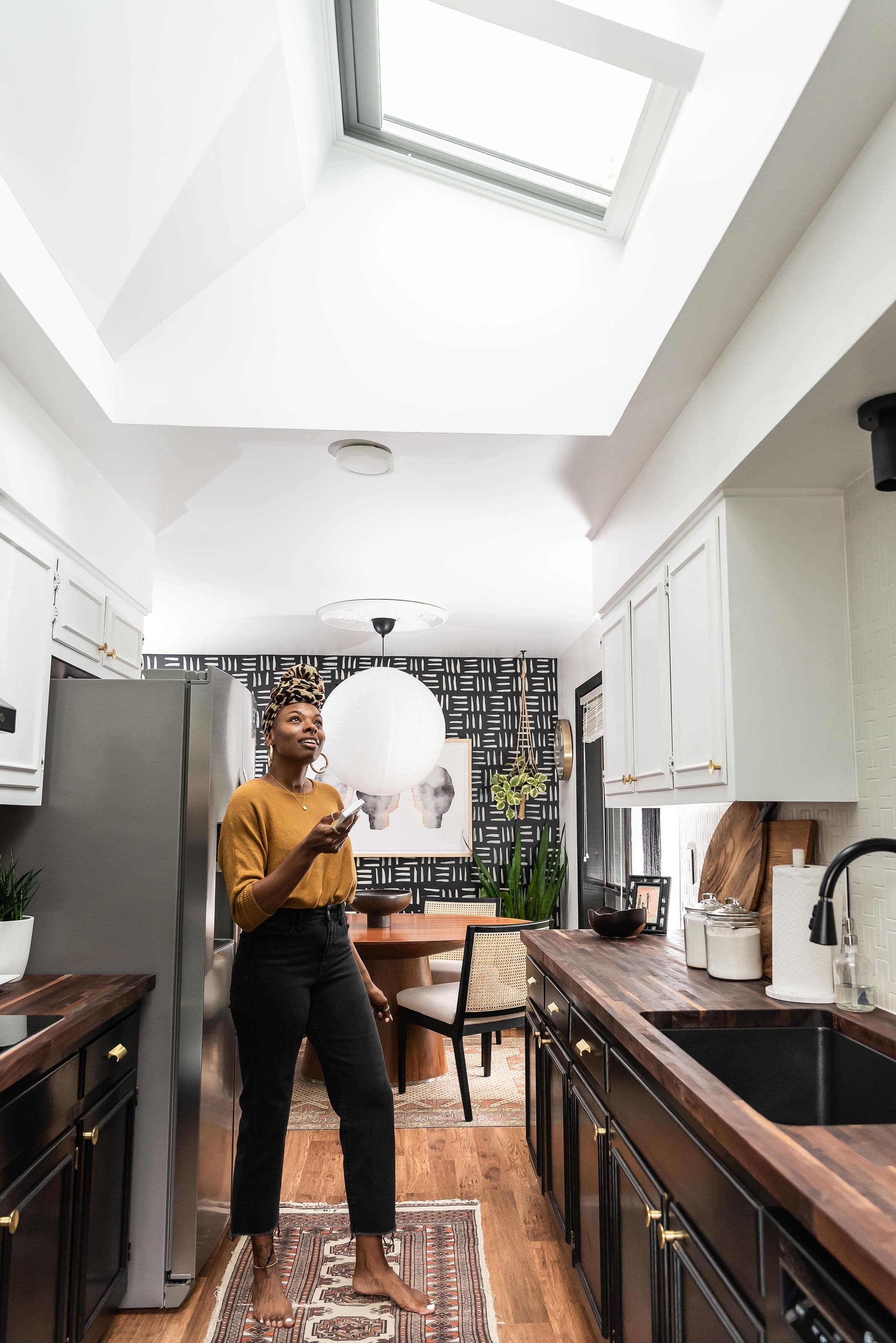 Black and white kitchen with skylights