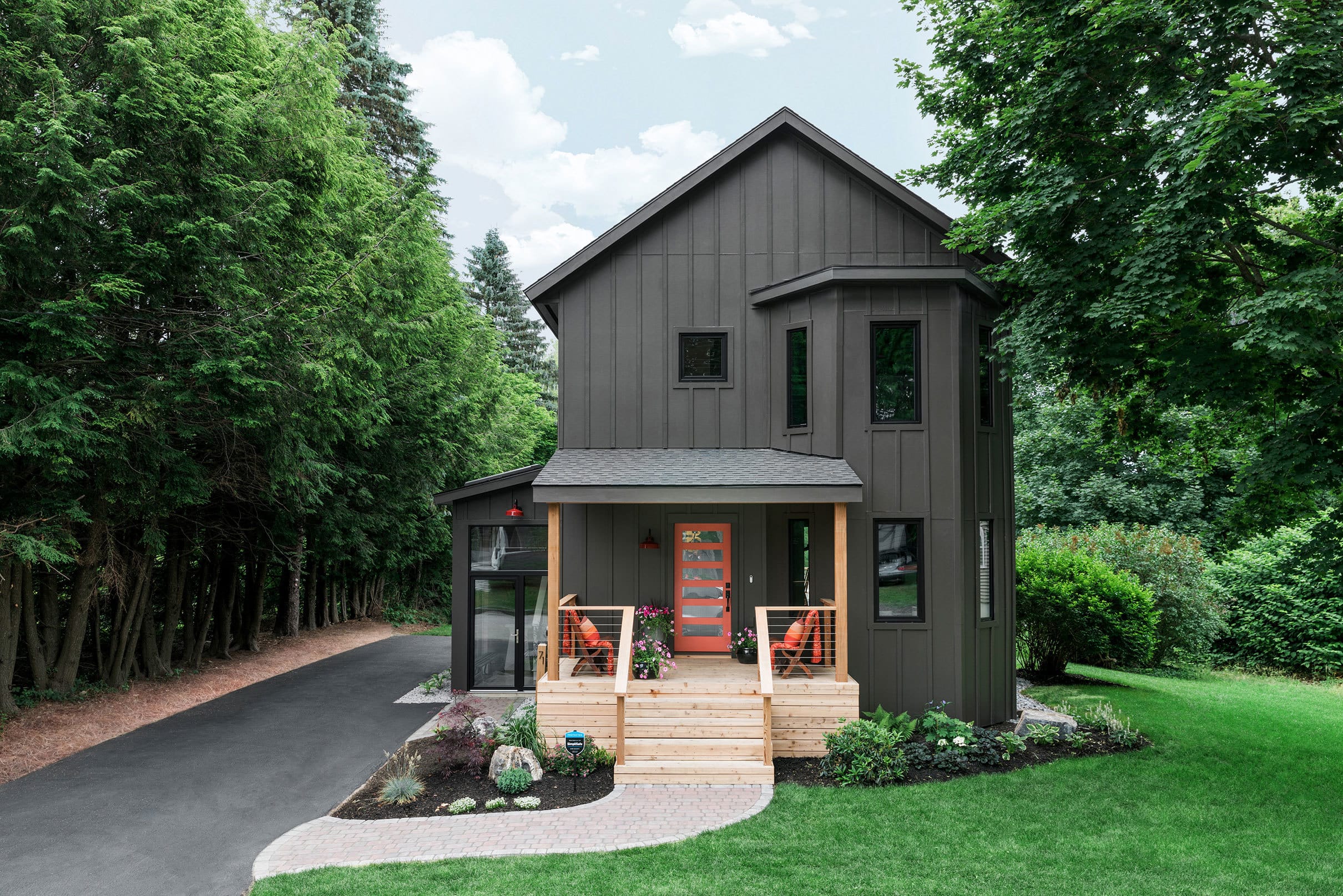 Grey house with a colorful porch