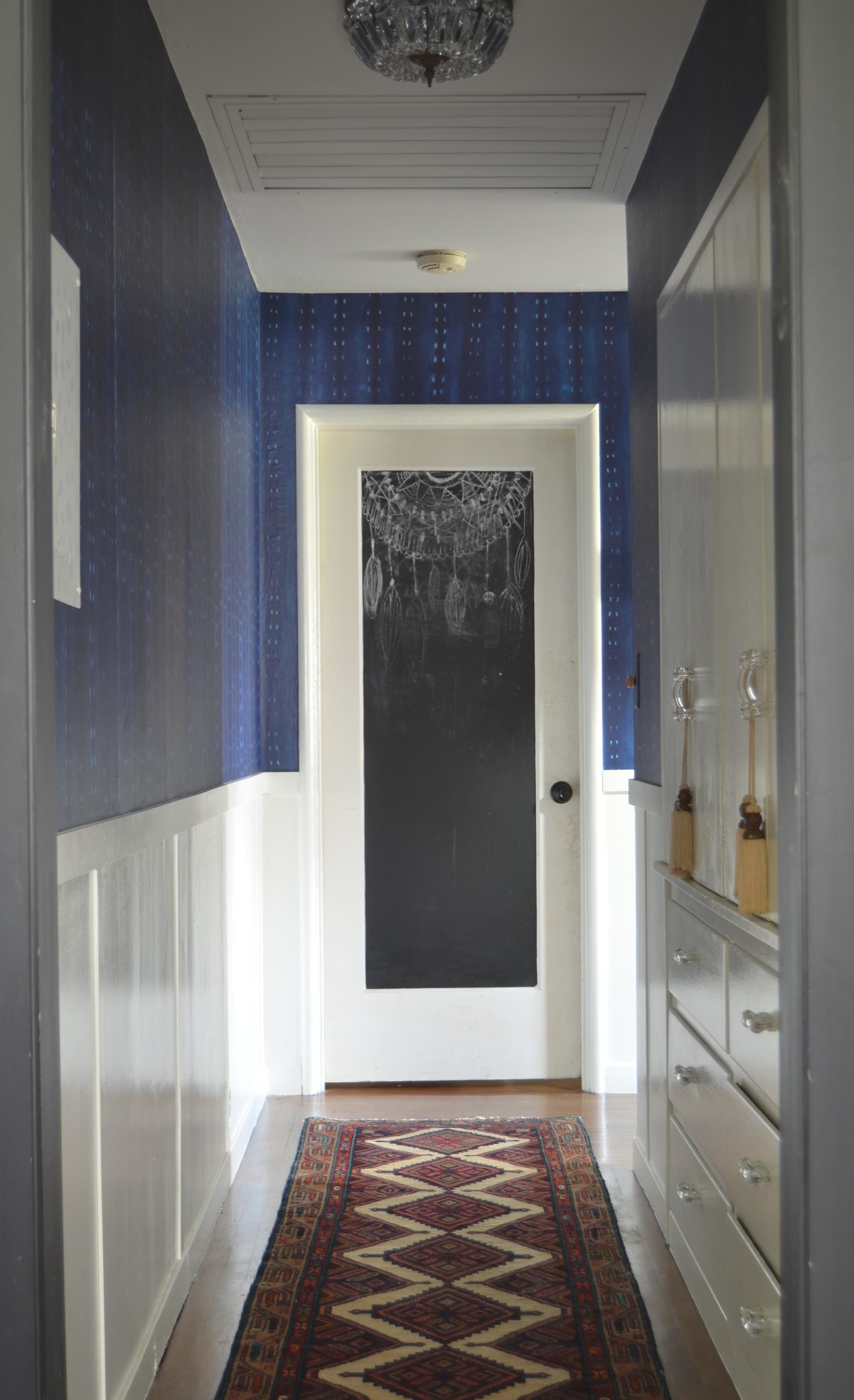 Hallway rug blue wallpaper dark