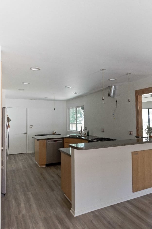 Kitchen gray floor u shaped countertop