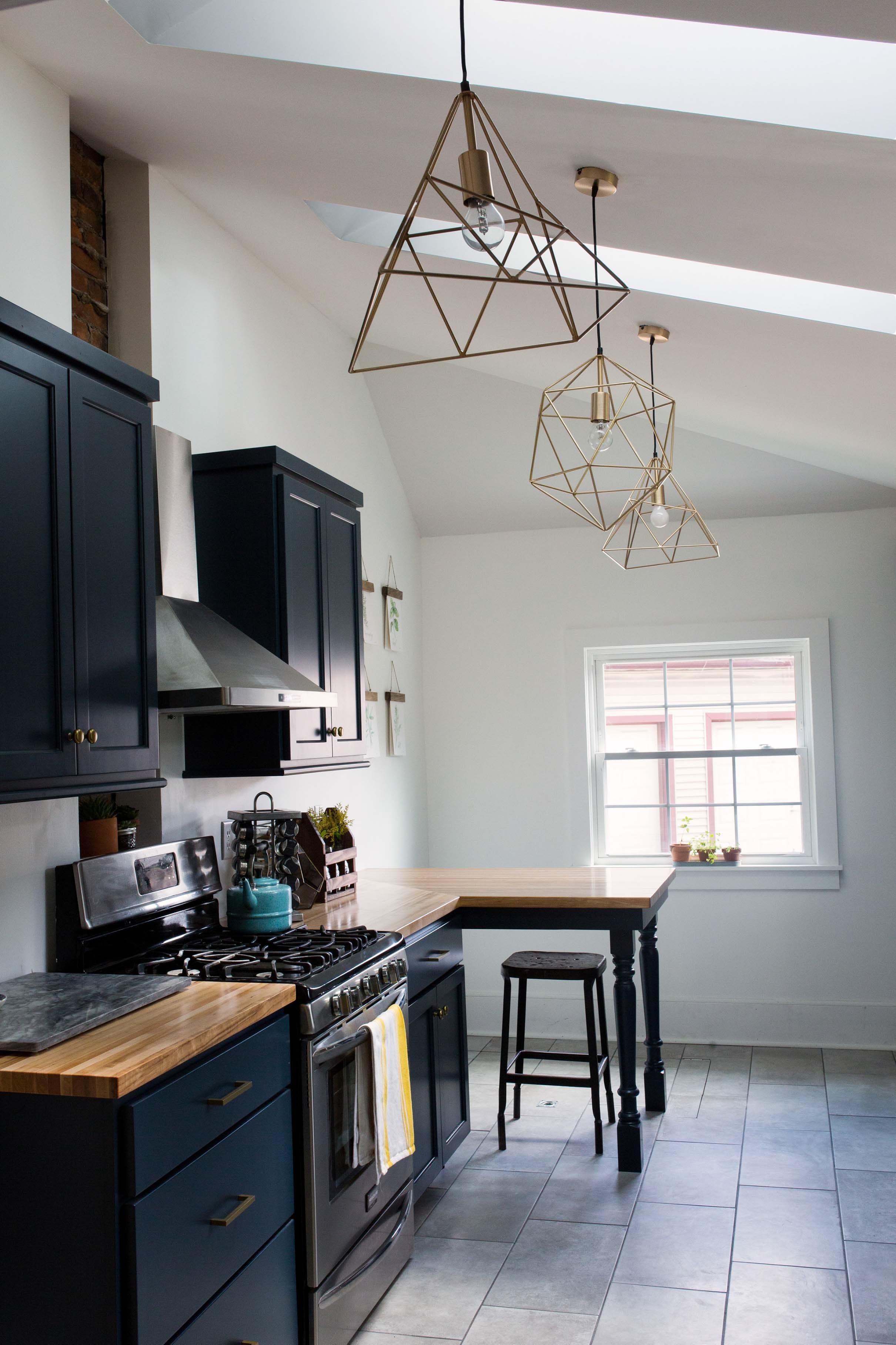 Kitchen skylights butcher block countertops blue cabinets stove