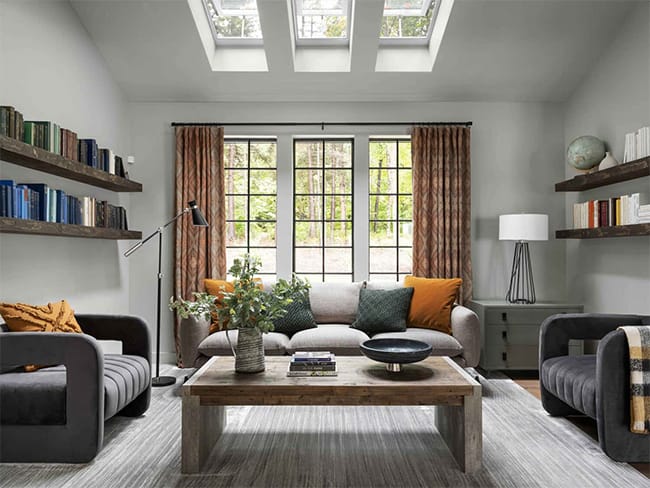 Living room three skylights gray sofas