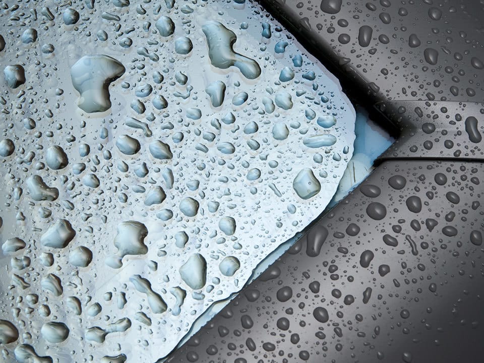 Close up of rain drops on a skylight