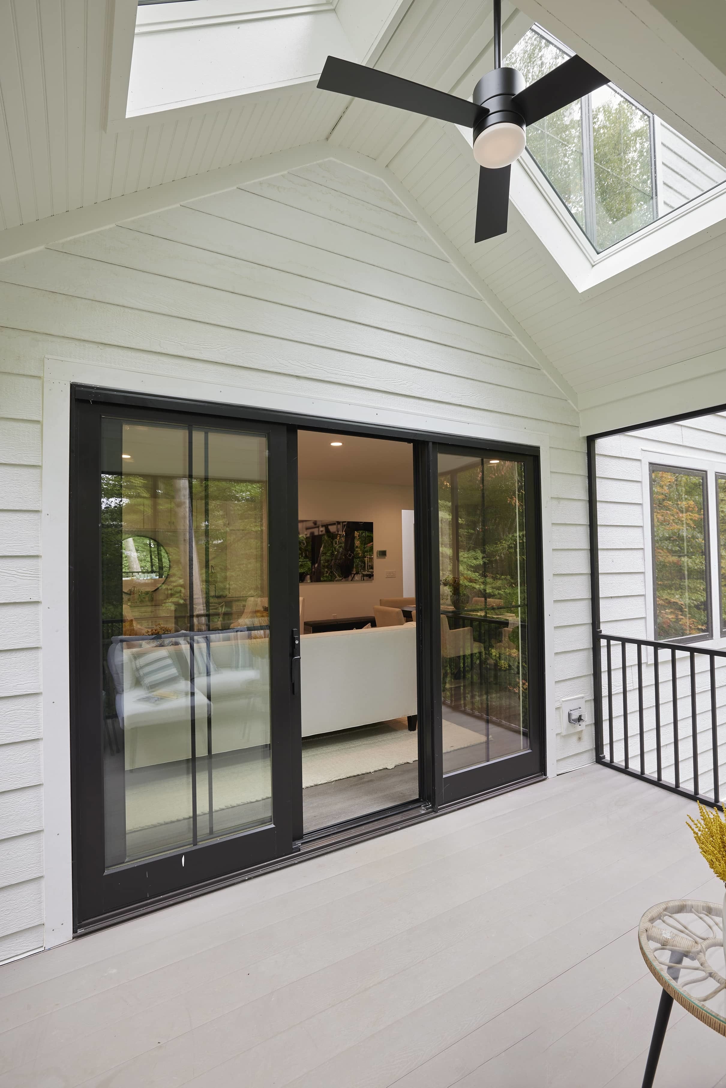 Screened porch skylights wood floor sliding glass door