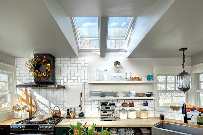 Black and white kitchen after skylights installed