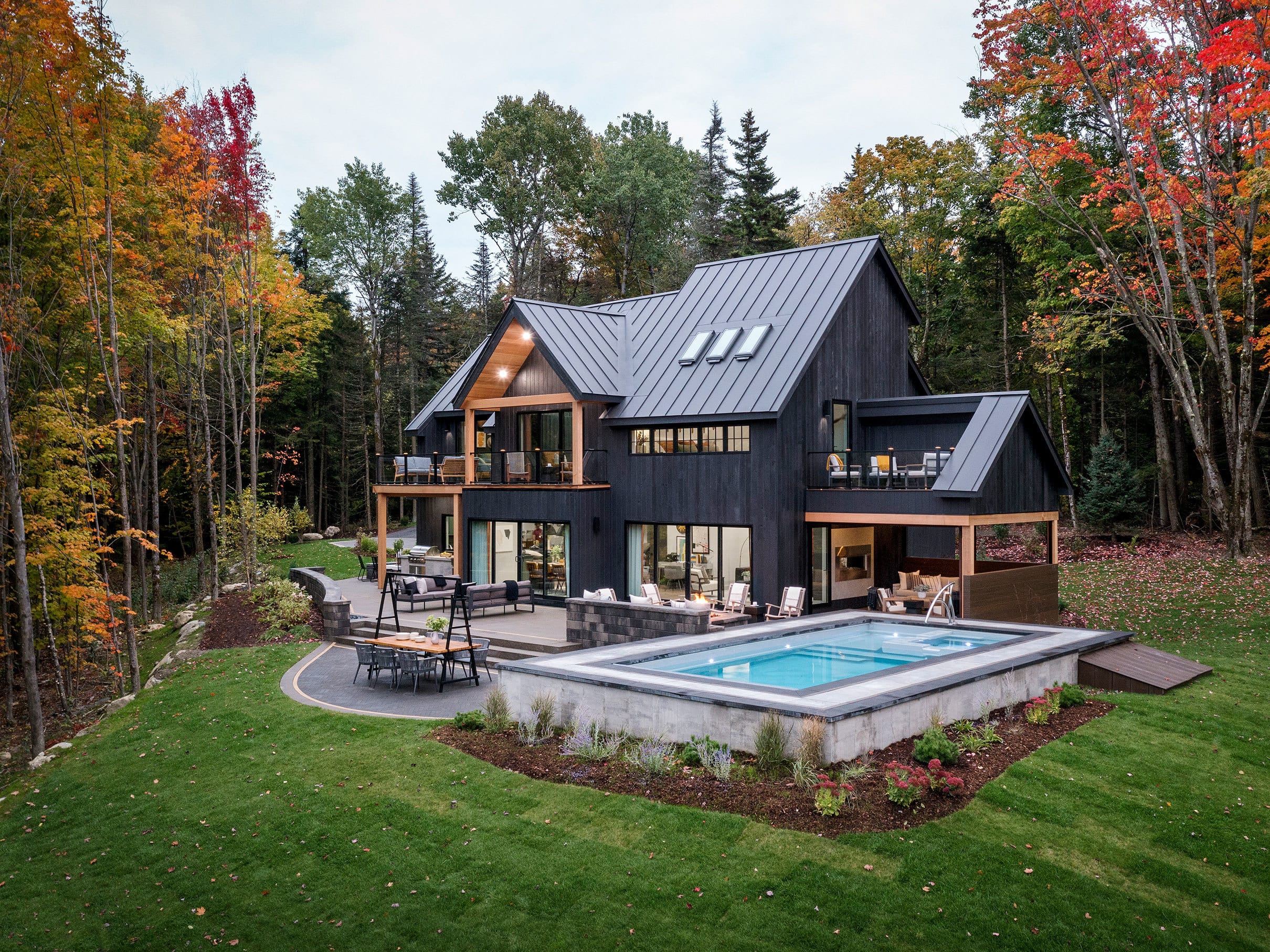 Home exerior black pool fall leaves