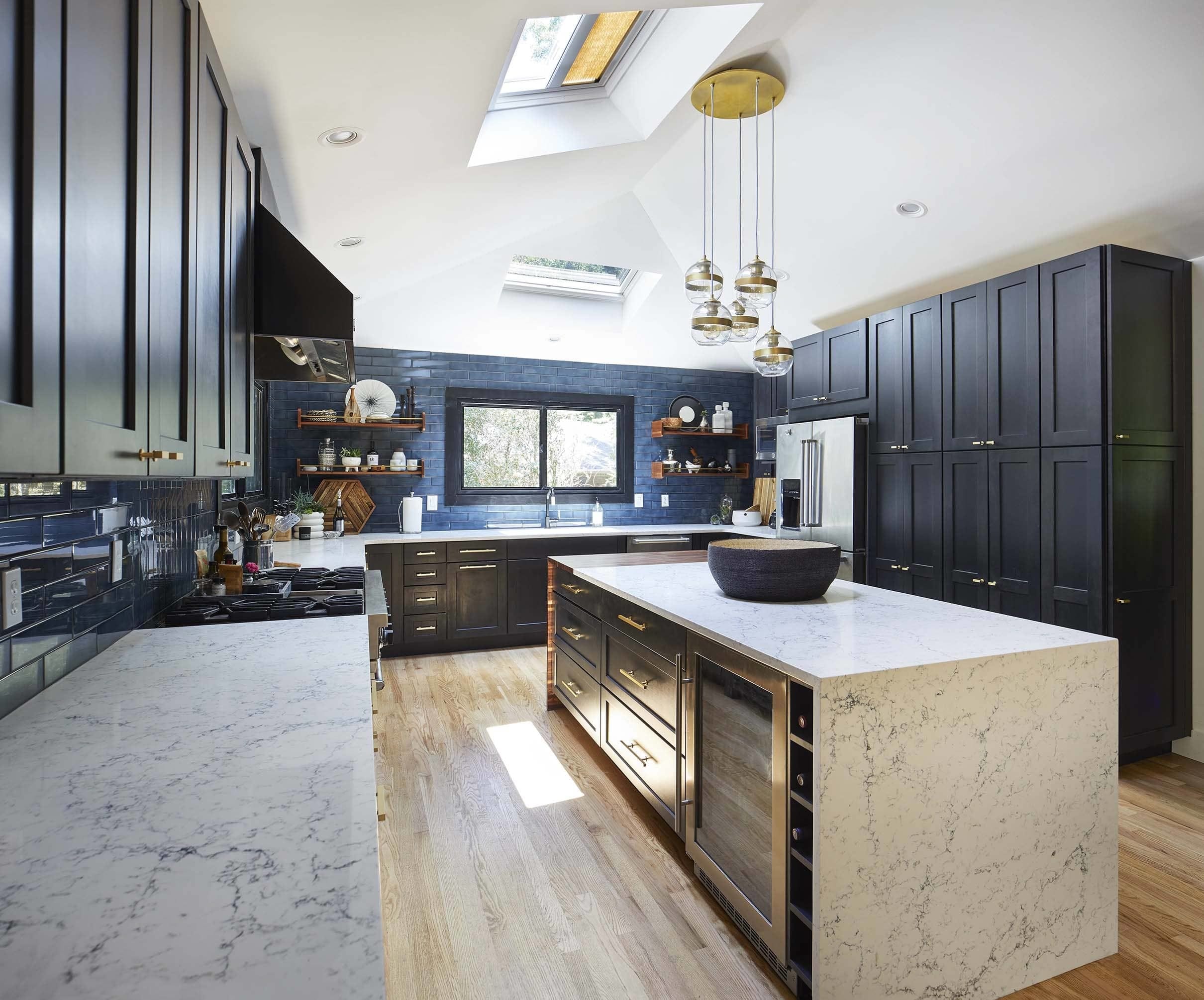 Kitchen blue black skylights island