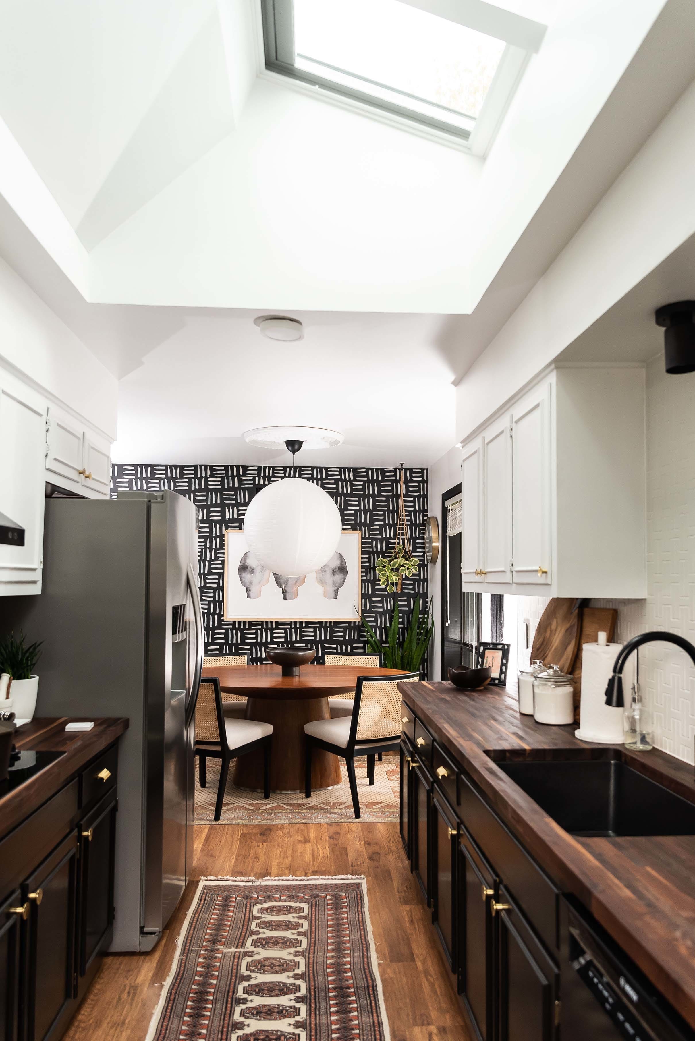 Kitchen skylights black and white cabinets
