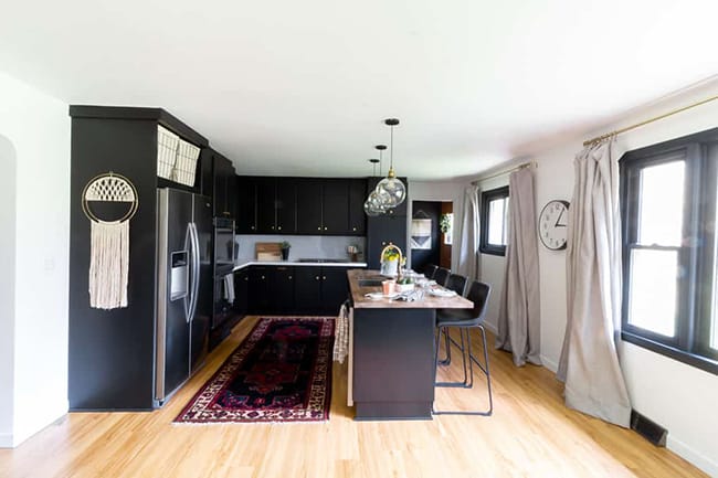 Open plan kitchen dark before skylights installed