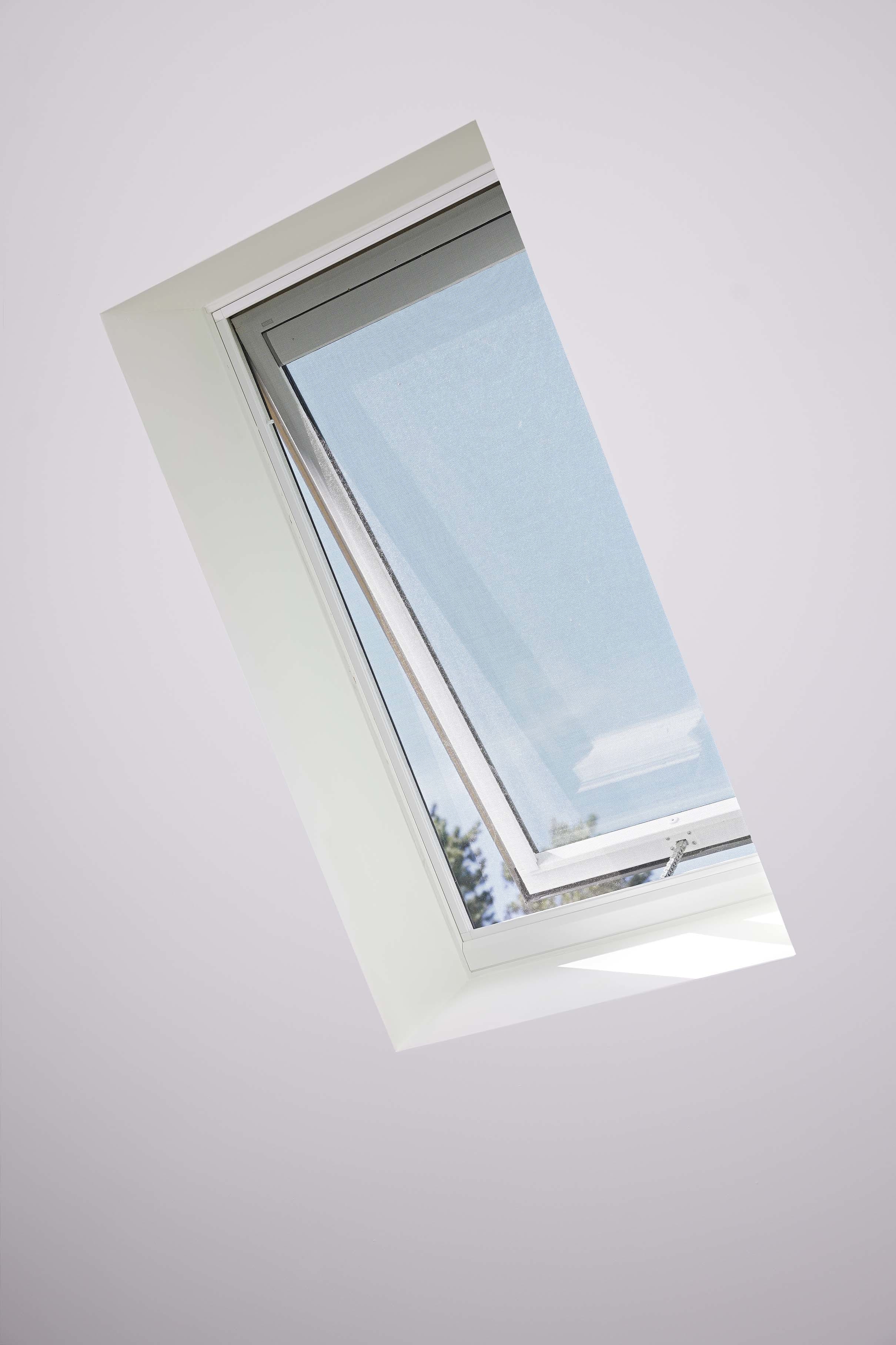 Open skylight white ceiling blue sky