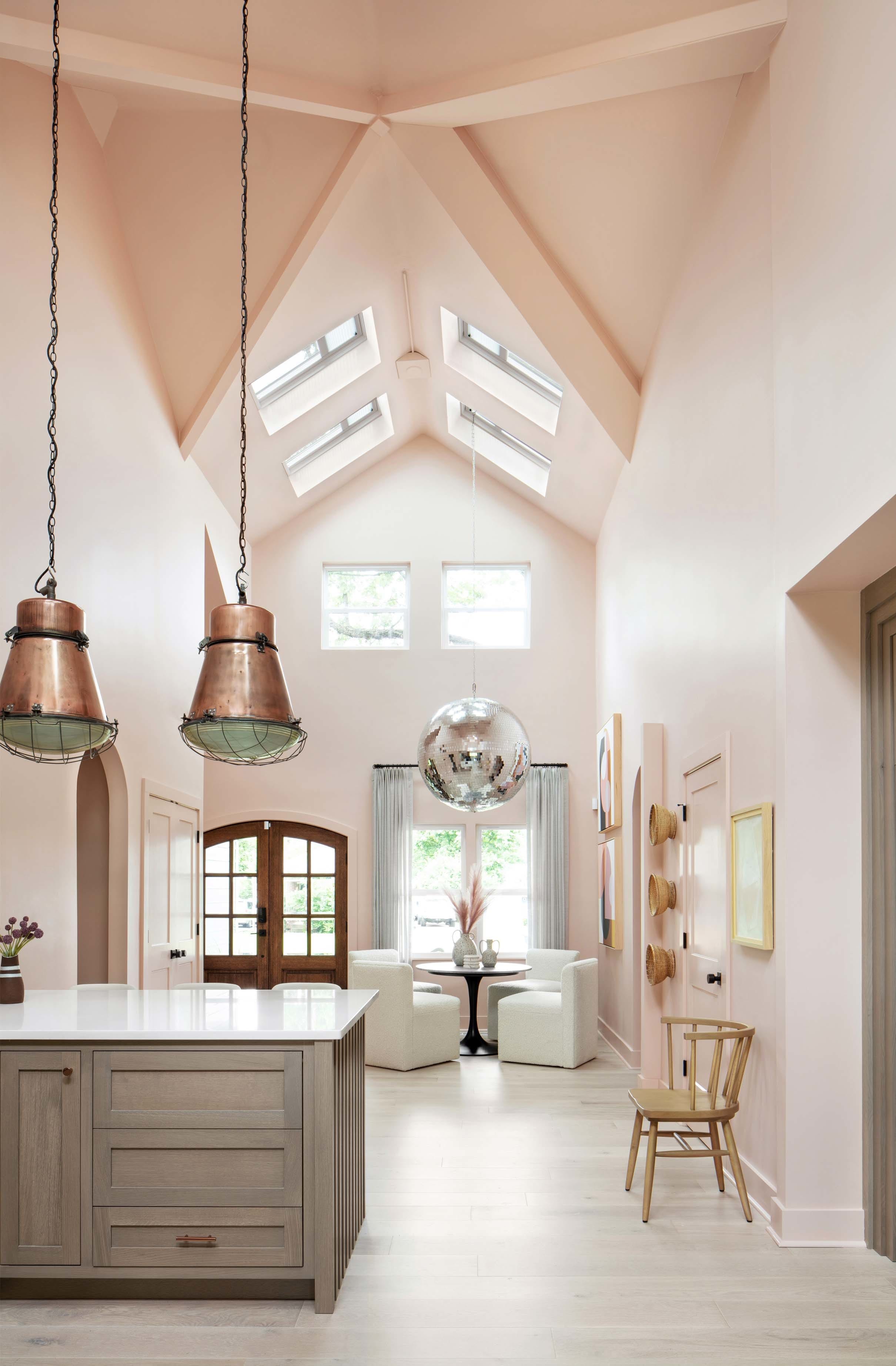 Pink dining room disco ball chanelier skylights