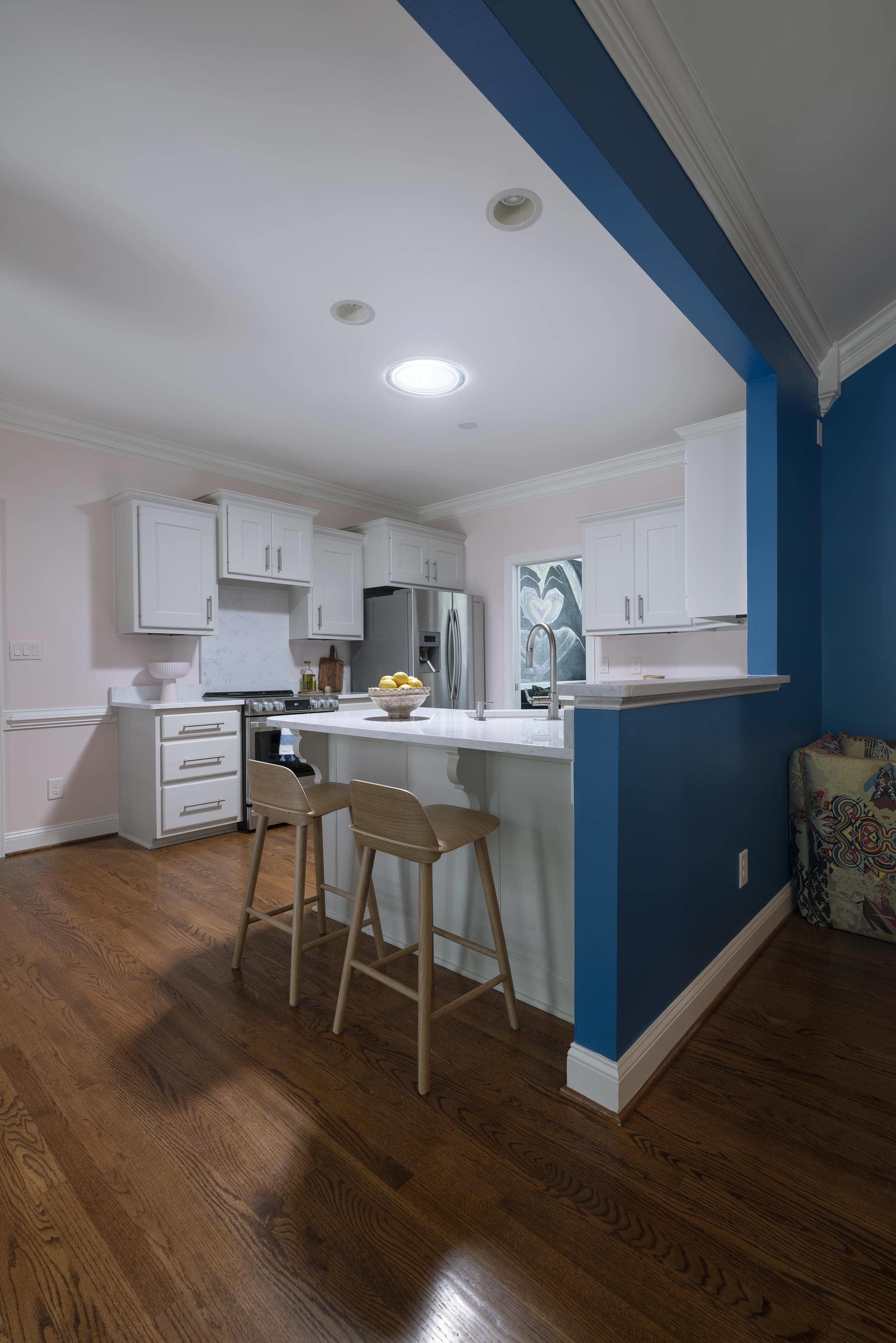 Pink kitchen with sun tunnel