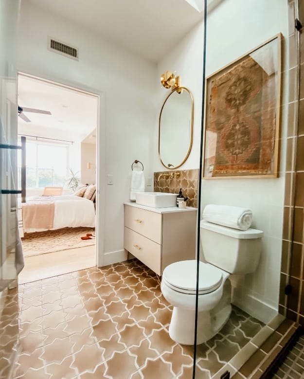 Small bathroom tan tile doorway